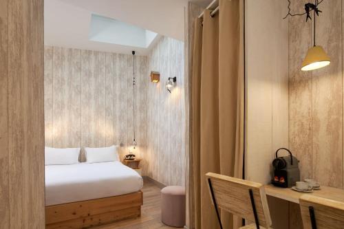 Habitación Doble Clásica con balcón o terraza del hotel Les Plumes. Foto 10