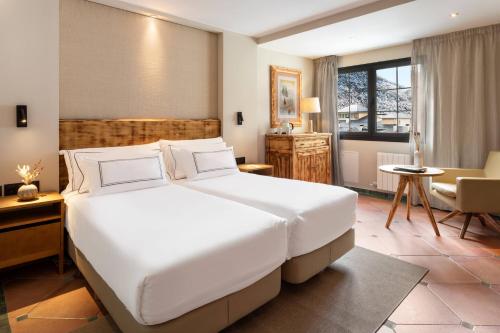 Habitación Deluxe con vistas a la montaña del hotel Melia Sol Y Nieve. Foto 4