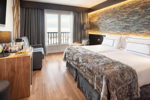 Habitación Triple The Level con vistas a la montaña del hotel Melia Sierra Nevada. Foto 4