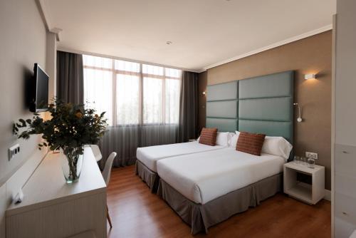 Habitación Doble - 1 o 2 camas del hotel PAX. Foto 5