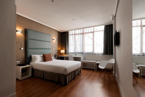 Habitación Doble adaptada para personas con movilidad reducida del hotel PAX. Foto 2