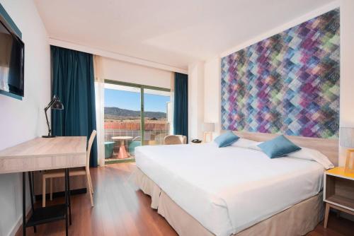 Habitación Estándar con balcón del hotel Guadalajara and Conference Center Affiliated By Meliá. Foto 3