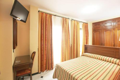 Habitación Triple del hotel El Cisne. Foto 1