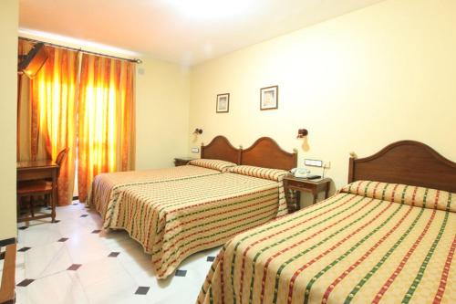Habitación Triple del hotel El Cisne. Foto 3