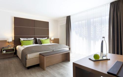 Habitación Premium con cama extragrande del hotel Lindner Dusseldorf Airport, Part Of Jdv By Hyatt. Foto 11