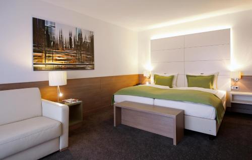 Suite Junior con sofá cama del hotel Lindner Dusseldorf Airport, Part Of Jdv By Hyatt. Foto 11