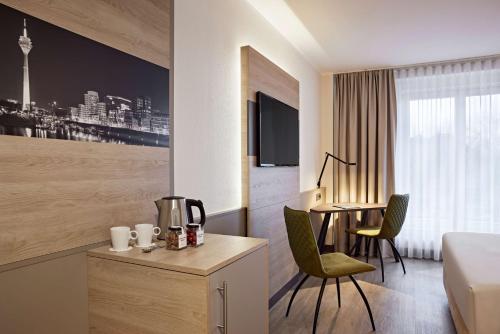 Habitación Doble Deluxe - 2 camas del hotel Lindner Dusseldorf Airport, Part Of Jdv By Hyatt. Foto 9