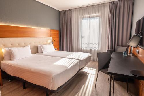 Habitación Deluxe del hotel Eurostars Amara. Foto 1