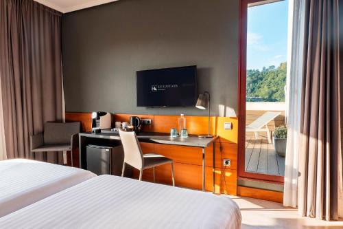 Habitación Doble Deluxe con balcón del hotel Eurostars Amara. Foto 4