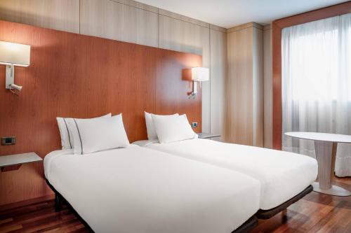 Habitación Doble Estándar con vistas a la ciudad - 2 camas del hotel Ac Huelva By Marriott. Foto 1