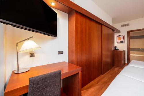 Habitación Doble con cama supletoria - 1 o 2 camas del hotel Senator Huelva. Foto 3