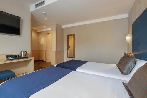 Habitación Doble con terraza - 1 o 2 camas del hotel Pedro I de Aragon. Foto 10