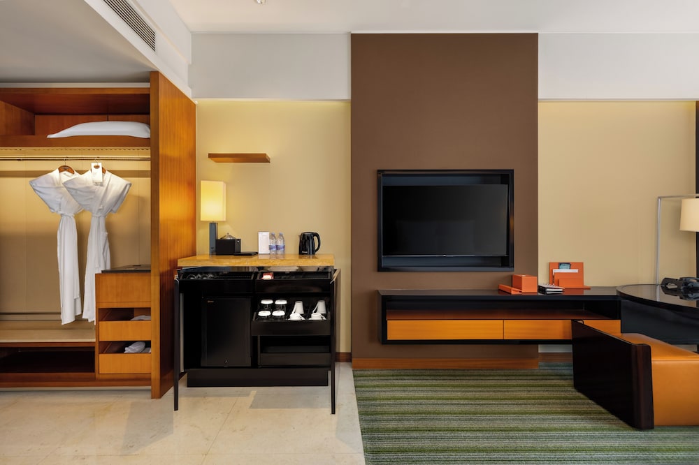 Habitación Deluxe con 1 cama king size del hotel Pullman Dongguan Changan. Foto 4