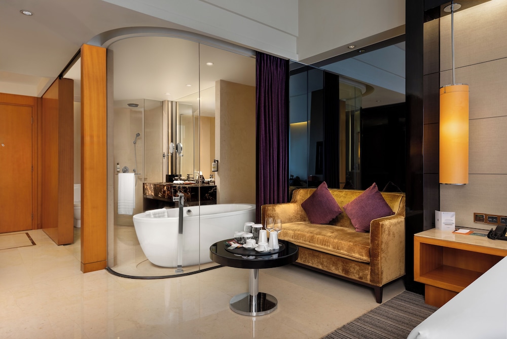 Habitación Deluxe con 2 camas individuales del hotel Pullman Dongguan Changan. Foto 9