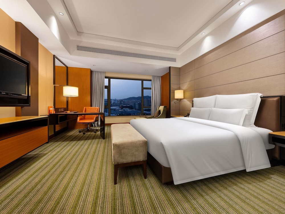 Suite Deluxe con 1 cama King Size del hotel Pullman Dongguan Changan. Foto 5