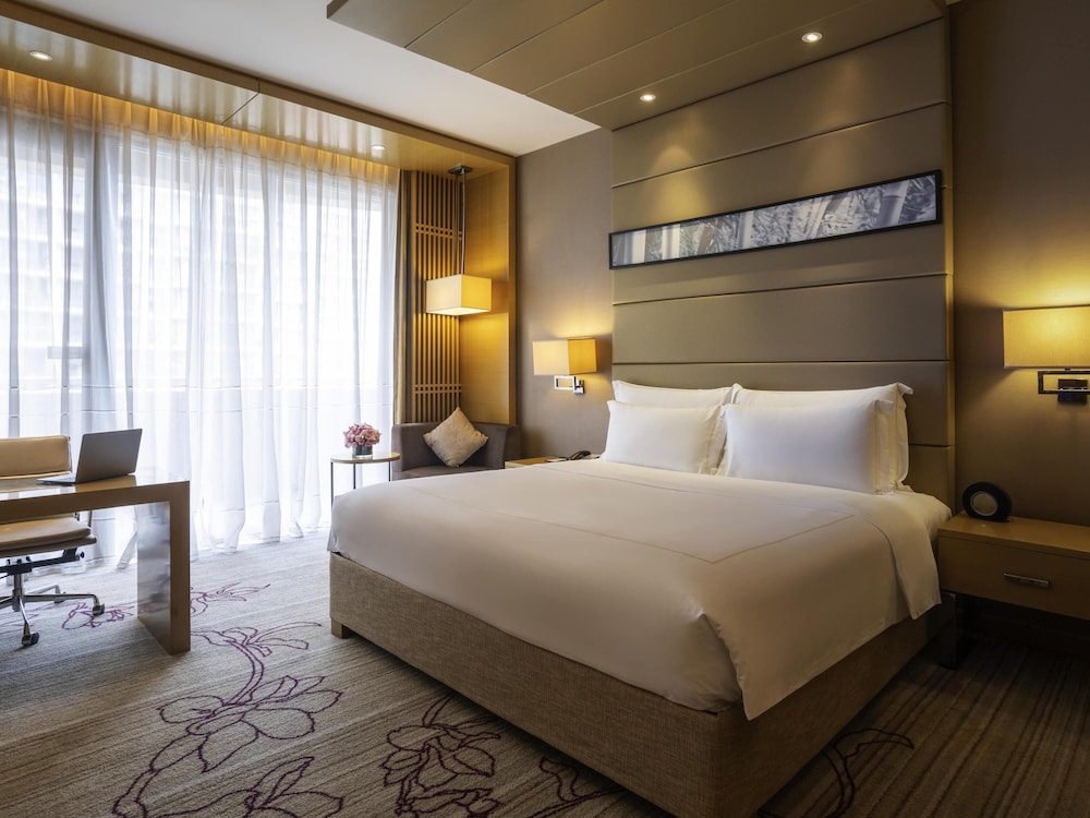 Suite Superior, acceso al salón, 1 cama King Size del hotel Pullman Foshan Shunde
