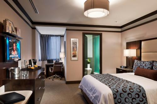 Habitación Superior con cama Queen del hotel The Pearl New York. Foto 3