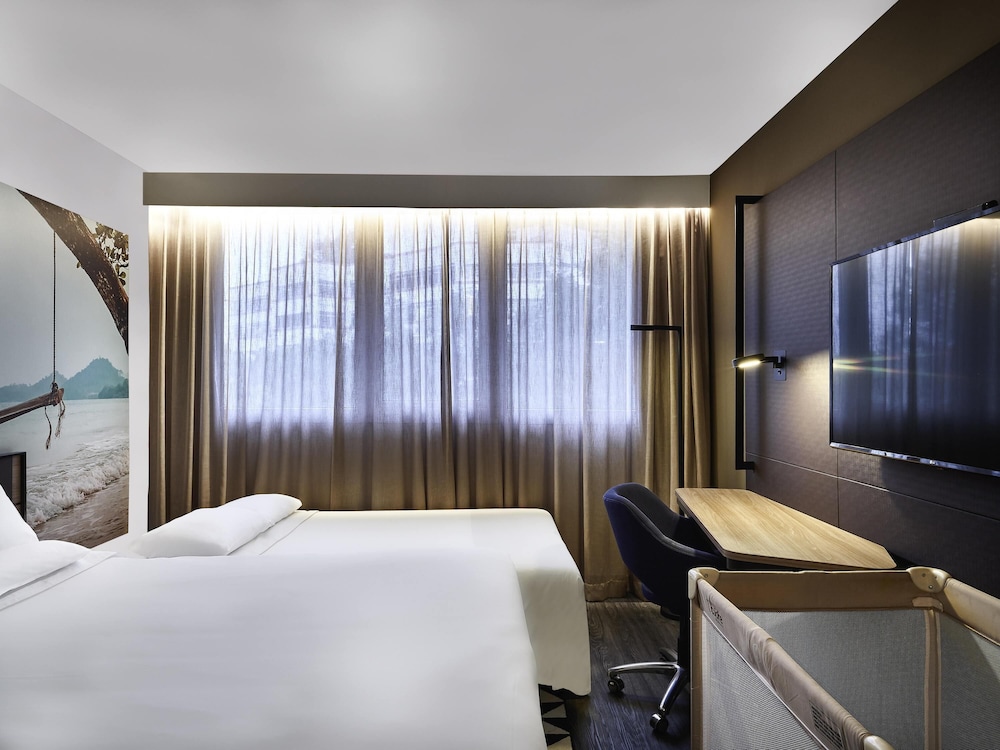 Apartamento familiar con cama Queen y sofá - cama para niños del hotel Novotel São Paulo Morumbi. Foto 3
