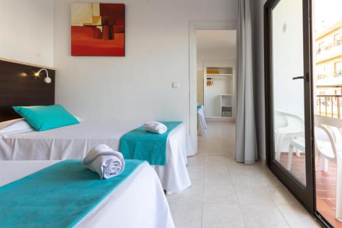 Quadruple Room - Happy Tribe del hotel Orosol. Foto 1