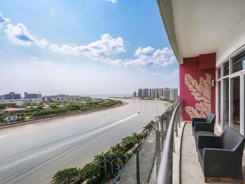 Habitación Executive King con balcón privado y vistas al mar - Acceso al lounge del hotel Pullman Haikou. Foto 2