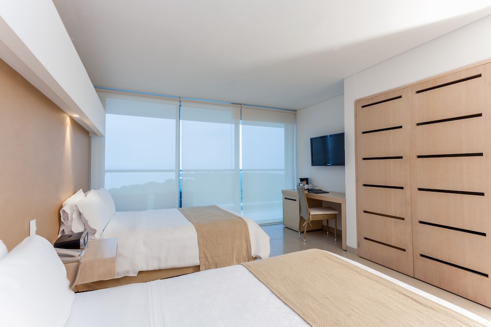 Habitación estándar doble con dos camas, 2 camas dobles del hotel Sonesta Cartagena. Foto 3