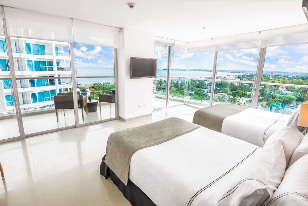 Habitación estándar doble con dos camas, 2 camas dobles del hotel Sonesta Cartagena. Foto 7
