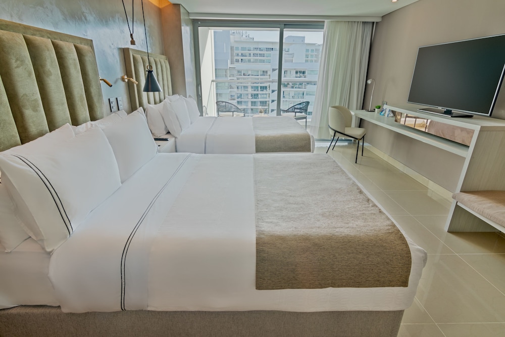 Habitación superior doble con dos camas, 2 camas dobles del hotel Sonesta Cartagena