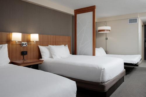 Dos camas queen (con sofá - cama) del hotel Hyatt Place New Orleans Convention Center. Foto 2