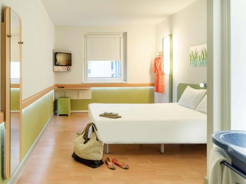 Habitación Estandar del hotel Ibis Budget Wien Sankt Marx. Foto 1