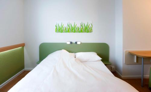 Habitación Estandar del hotel Ibis Budget Wien Sankt Marx. Foto 4