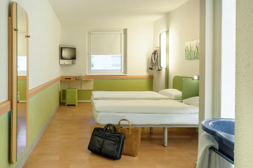 Habitación Doble Estándar - 2 camas del hotel Ibis Budget Wien Sankt Marx. Foto 14