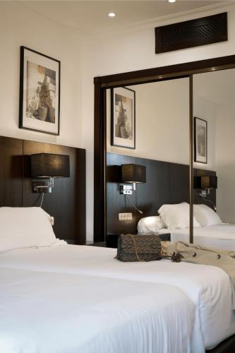 Habitación Doble adaptada para personas con discapacidad - 2 camas del hotel HO Ciudad de Jaén. Foto 1