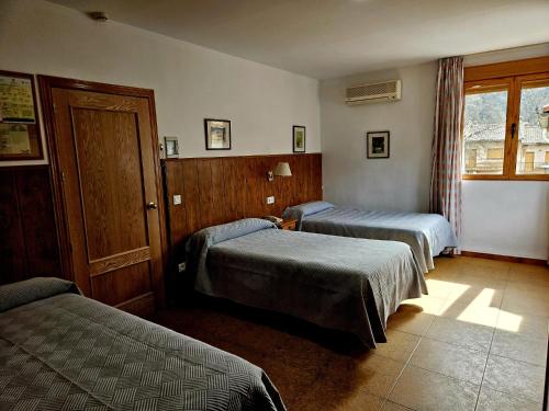 Habitación Triple del hotel Montaña De Cazorla. Foto 1