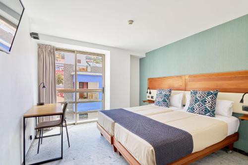 Twin room del hotel Torre Del Conde. Foto 1