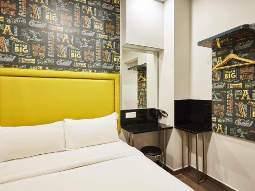 Habitación temática estándar con 1 cama doble del hotel Ibis Budget Singapore Bugis (sg Clean). Foto 3