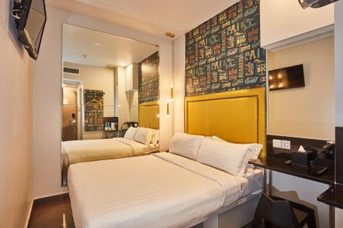 Habitación temática estándar con 1 cama doble del hotel Ibis Budget Singapore Bugis (sg Clean). Foto 5