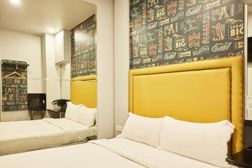 Habitación temática estándar con 1 cama doble del hotel Ibis Budget Singapore Bugis (sg Clean). Foto 7