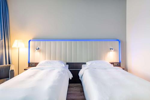Habitación Superior - Planta superior del hotel Park Inn by Radisson Stuttgart. Foto 1