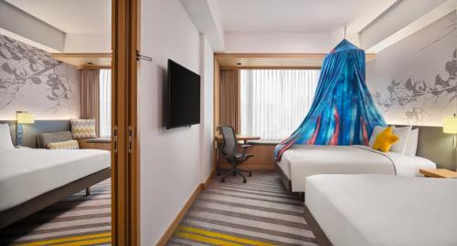 Habitación Familiar Deluxe del hotel Hilton Garden Inn Singapore Serangoon. Foto 6