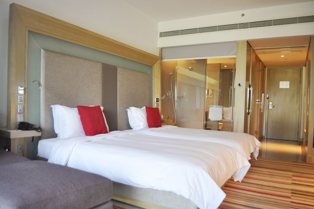 Habitación estándar con 2 camas individuales del hotel Novotel Nanjing East Suning. Foto 1