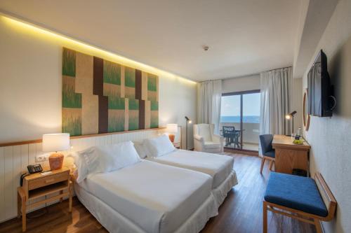 Habitación Deluxe del hotel H10 Taburiente Playa. Foto 2