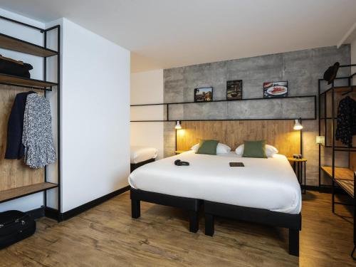 Standard Room with One Double Bed and One Sofa Bed for One Person del hotel ibis Lyon Sud Oullins. Foto 4
