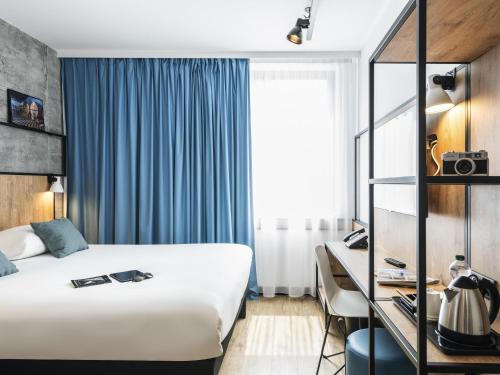 Premium Double Room with Sofa Bed del hotel ibis Lyon Sud Oullins. Foto 3
