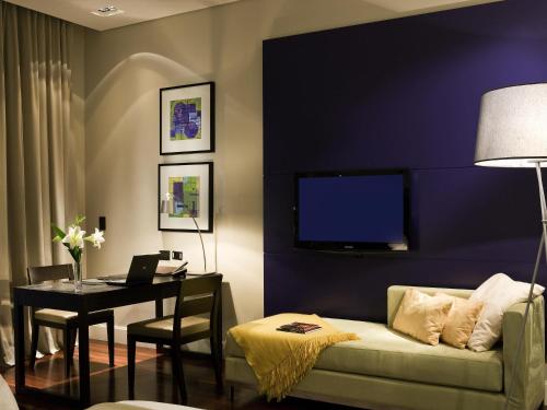 Habitación superior con 2 camas individuales del hotel Sofitel La Reserva Cardales. Foto 5