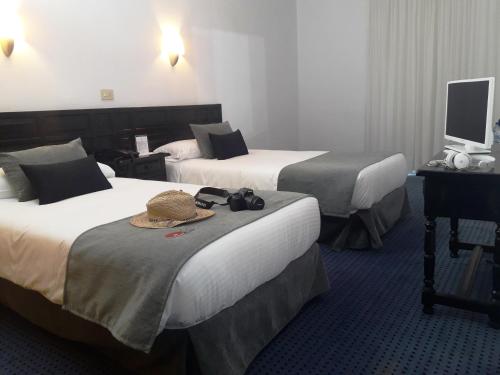 Habitación Doble Económica - 2 camas del hotel Miramar. Foto 11