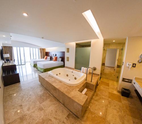 Suite de lujo del hotel Azul Ixtapa Grand All Inclusive Suites and Spa. Foto 4