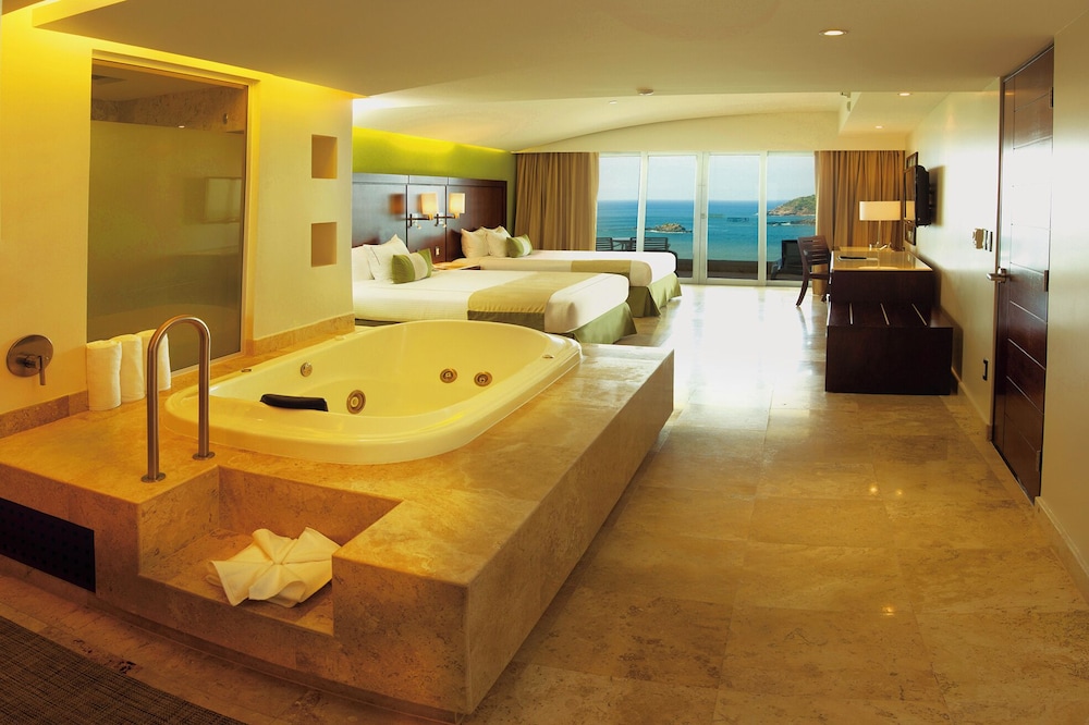 Suite de lujo, 2 camas dobles del hotel Azul Ixtapa Grand All Inclusive Suites and Spa. Foto 1