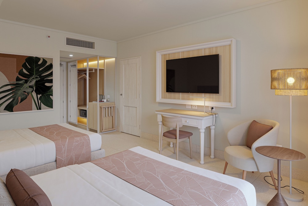 Habitación Club, 2 camas dobles (Vista Tropical) del hotel Wyndham Alltra Punta Cana All-Inclusive Resort. Foto 1