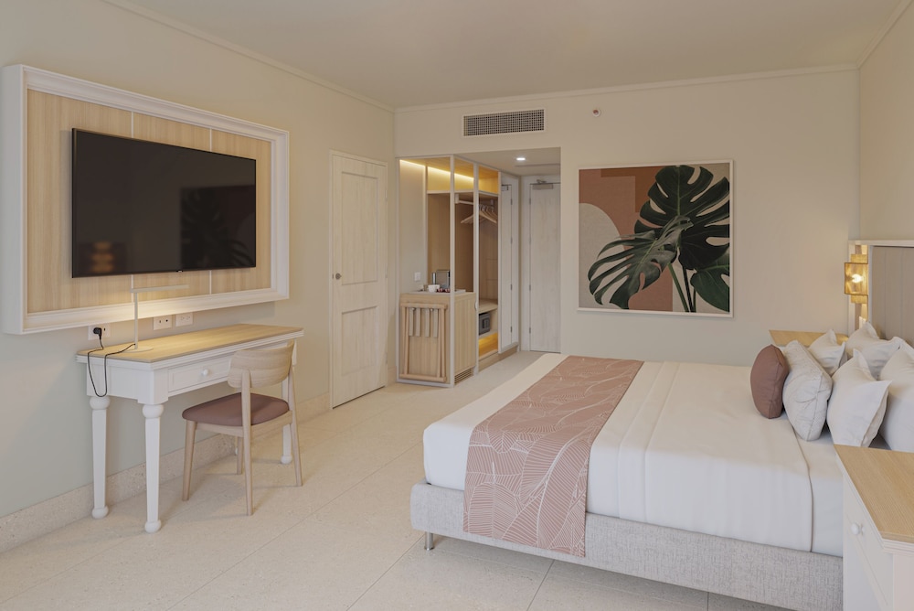 Habitación Club, 1 cama King (Vista Tropical) del hotel Wyndham Alltra Punta Cana All-Inclusive Resort. Foto 1