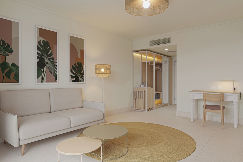 Suite Junior - 1 Cama King y 2 Camas Dobles del hotel Wyndham Alltra Punta Cana All-Inclusive Resort. Foto 2